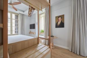 Postel nebo postele na pokoji v ubytování ICON Malabar + 37 fotografií