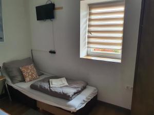 Posteľ alebo postele v izbe v ubytovaní Birs Vendégház