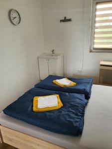 Posteľ alebo postele v izbe v ubytovaní Birs Vendégház