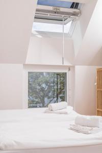 Posteľ alebo postele v izbe v ubytovaní Micro Rooftop Penzing