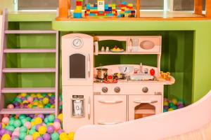 Kuchyň nebo kuchyňský kout v ubytování 閣樂親子旅宿Kids Fun Hotel