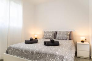 Voodi või voodid majutusasutuse Casa Lucien - Newly refurbished apartment with swimming pool - Ideal for couples toas +28 fotot