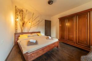 Voodi või voodid majutusasutuse Apartments Vidik toas