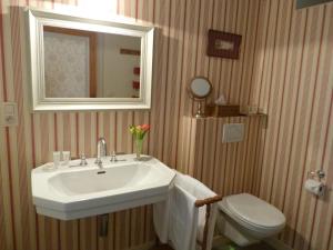 Kylpyhuone majoituspaikassa Guesthouse Alizée