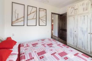 Voodi või voodid majutusasutuse Apartments Vidik toas
