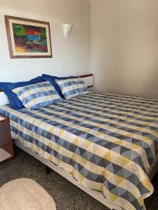 En eller flere senger på et rom på Iracema Residence Flat - Apto Particular