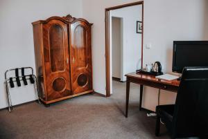 TV a/nebo společenská místnost v ubytování B&B Hotel Praha