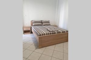 Posteľ alebo postele v izbe v ubytovaní Garden Lefkanti, 4season Plaza Room