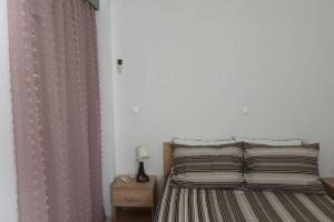 Posteľ alebo postele v izbe v ubytovaní Garden Lefkanti, 4season Plaza Room