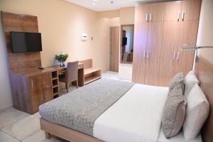 Ein Bett oder Betten in einem Zimmer der Unterkunft HOTEL ASTRAL