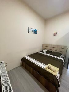 Voodi või voodid majutusasutuse Fazis Hotel toas
