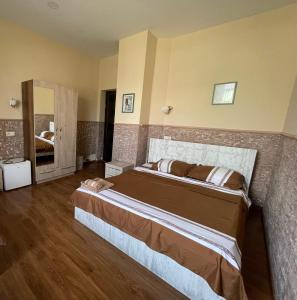 Voodi või voodid majutusasutuse Fazis Hotel toas