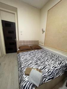 Voodi või voodid majutusasutuse Fazis Hotel toas