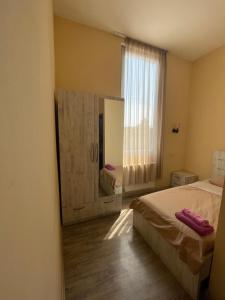 Voodi või voodid majutusasutuse Fazis Hotel toas