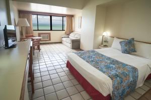 Säng eller sängar i ett rum på Hotel Dan Inn Mar Piedade - Grande Recife