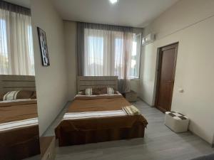 Voodi või voodid majutusasutuse Fazis Hotel toas
