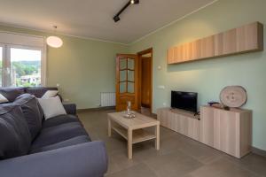 Televízia a/alebo spoločenská miestnosť v ubytovaní RB-5 RESIDENCIAL BEGUR 6 PaX