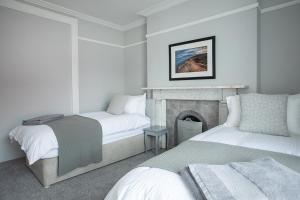 Ліжко або ліжка в номері Rooms@Mourne