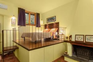 A bed or beds in a room at Toscana da Sogno a Villa Allegria Még 37 kép