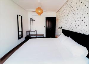 Posteľ alebo postele v izbe v ubytovaní Hotel Matilde by gaiarooms