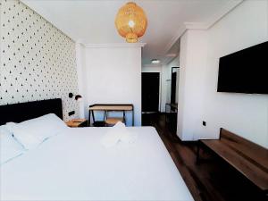 Posteľ alebo postele v izbe v ubytovaní Hotel Matilde by gaiarooms