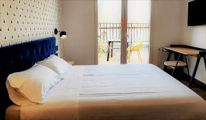 Posteľ alebo postele v izbe v ubytovaní Hotel Matilde by gaiarooms