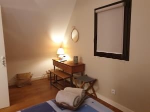 Ein Bett oder Betten in einem Zimmer der Unterkunft LA MAISON DE BIORD