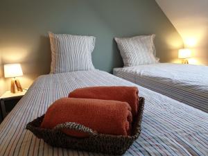 Ein Bett oder Betten in einem Zimmer der Unterkunft LA MAISON DE BIORD