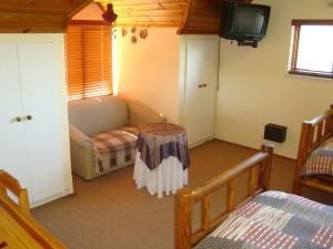 Säng eller sängar i ett rum på Pentzhaven Guesthouse