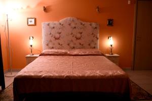 A bed or beds in a room at La Casa Della Volpe