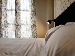 Posteľ alebo postele v izbe v ubytovaní Hotel Matilde by gaiarooms