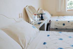 Postelja oz. postelje v sobi nastanitve Glenhill B&B