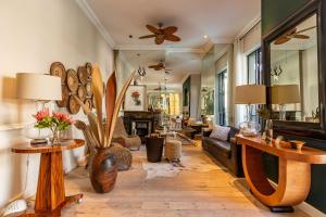 a living room with a couch and a table at Mountview Guest House in Cape Town