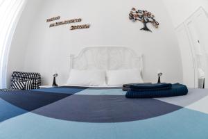 Postel nebo postele na pokoji v ubytování "DueEmme Lodge" , a pochi passi dal porto