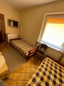 A bed or beds in a room at Lewin Stay