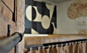 a close up of a wooden fence in a kitchen at LuX - Exclusive Trulli Relax in Alberobello