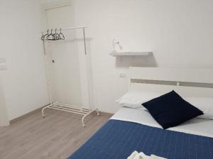 Łóżko lub łóżka w pokoju w obiekcie Bouganville da Giò