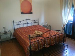 A bed or beds in a room at Pietra Preziosa Bed & Breakfast