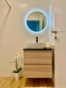 Ett badrum på Madagascar Apartman Keszthely