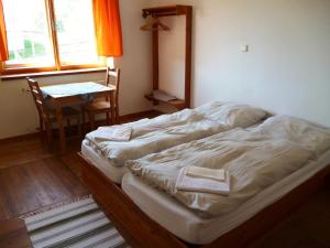 Кровать или кровати в номере Švehlíkova Chata