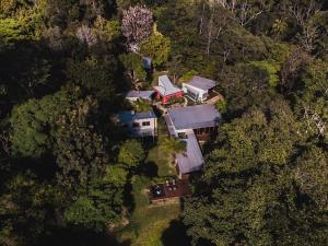 an overhead view of a house in the forest at Runawaytomaleny in Maleny