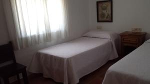 Postel nebo postele na pokoji v ubytování Casas Isabel
