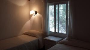 Postel nebo postele na pokoji v ubytování Casas Isabel