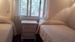 Postel nebo postele na pokoji v ubytování Casas Isabel