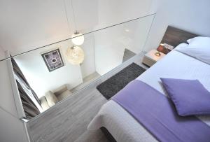 Posteľ alebo postele v izbe v ubytovaní Apartments & Rooms Lavandula Exclusive