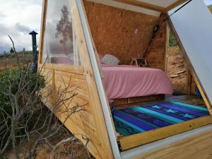 Ein Bett oder Betten in einem Zimmer der Unterkunft Andes Glamping