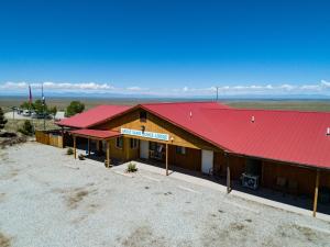 an overhead view of a barn with a red roof at Great Sand Dunes Lodge in Mosca