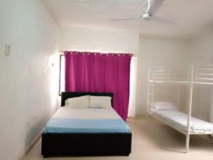 Impeccable 2-Bed Apartment in Kumasi Ashanti 객실 침대