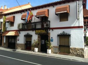 a hotel on the side of a street at Hostal Paracuellos in Paracuellos de Jarama