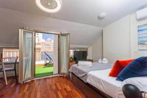Fotografie z fotogalerie ubytování Precioso Ático con terraza centro Historico Malaga v Malaze